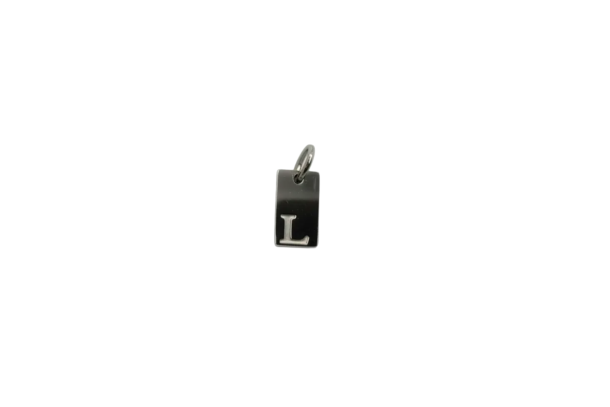 Silver rectangular tag with raised letter L