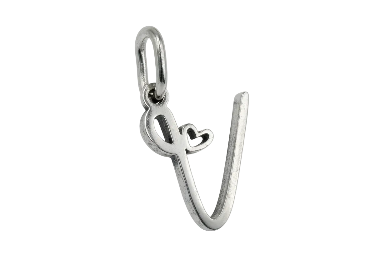 Polished silver script letter V with small open heart accent