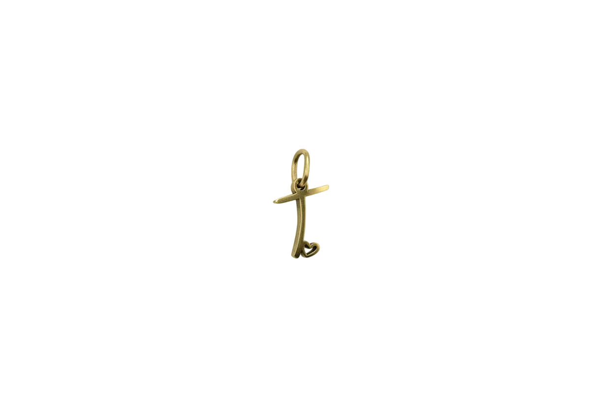 Gold script letter T with open heart detail