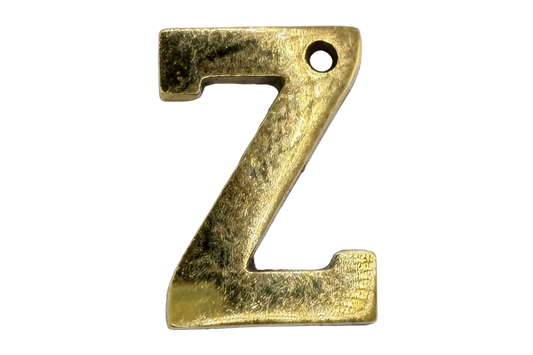 Textured gold letter Z with softly antiqued matte finish