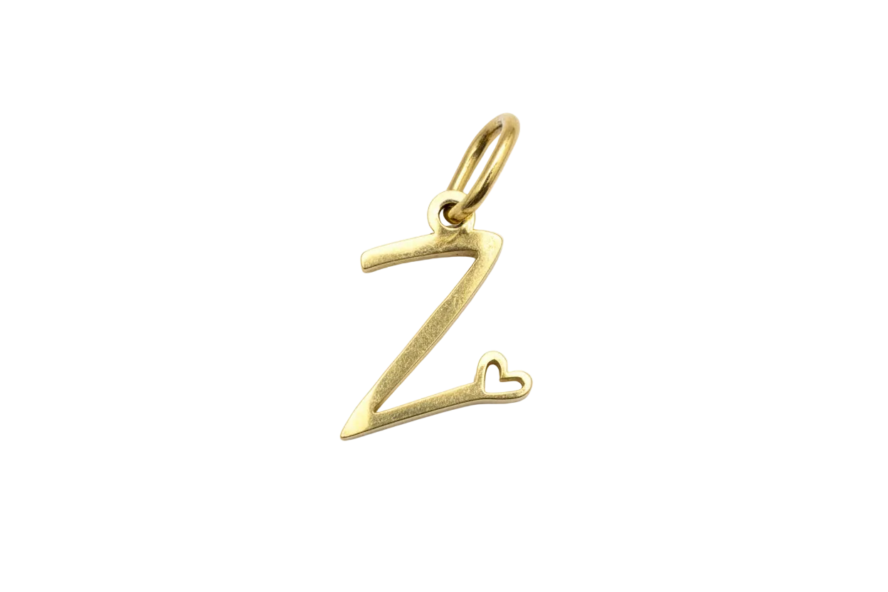 Gold letter Z initial with a small heart detail at the base