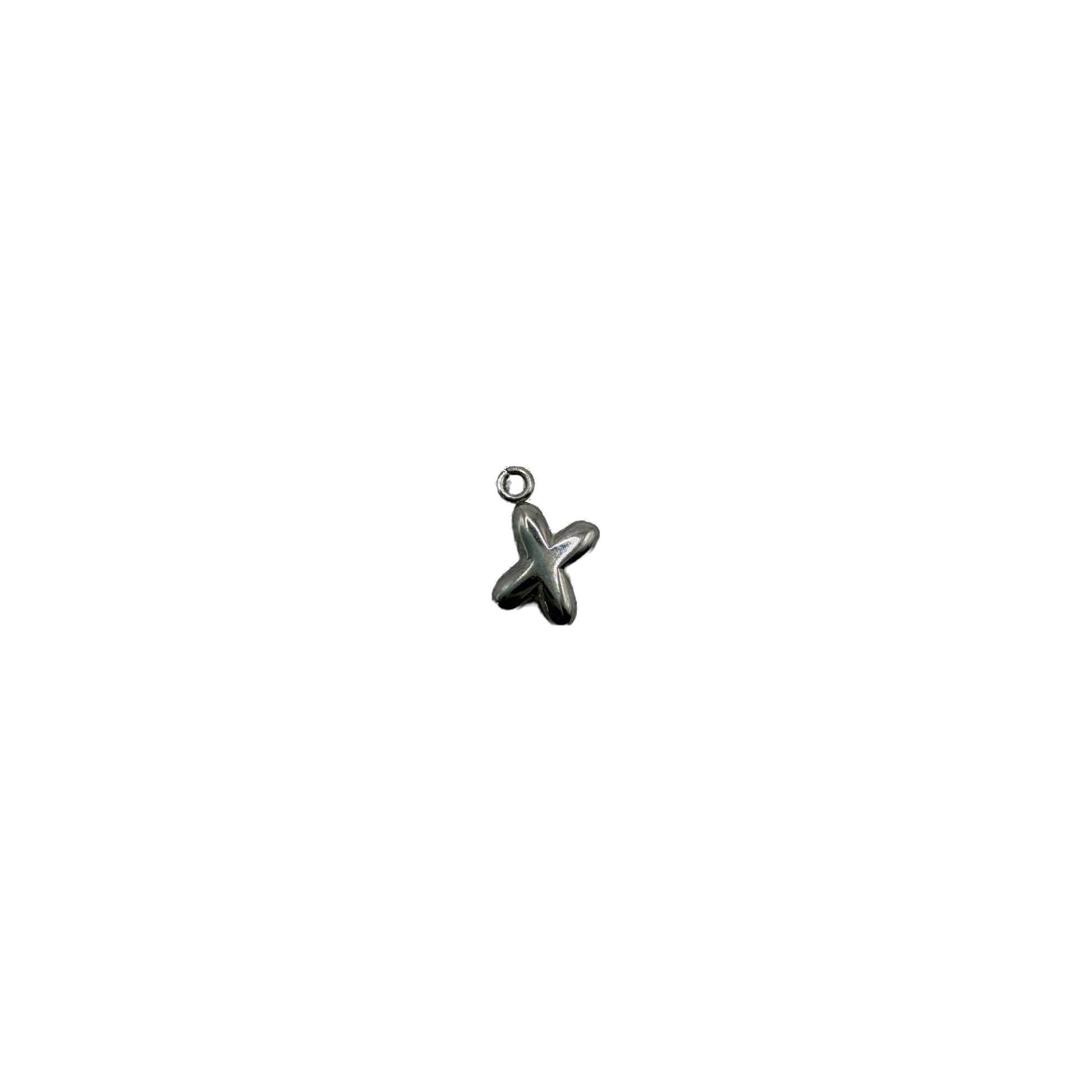 Polished silver starfish jewelry piece on black background