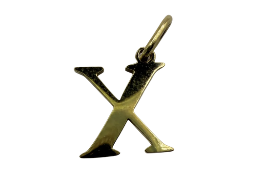 Polished gold initial X letter charm on black background