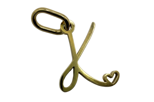 Gold script letter L initial with a small heart detail