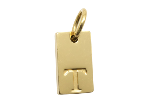 Polished gold rectangular tag with raised letter T