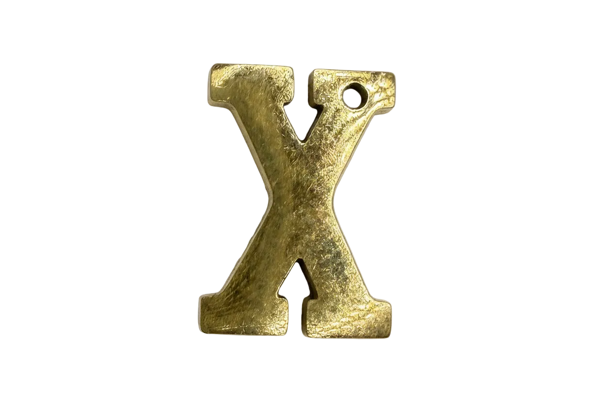 Textured gold X initial with a softly brushed finish