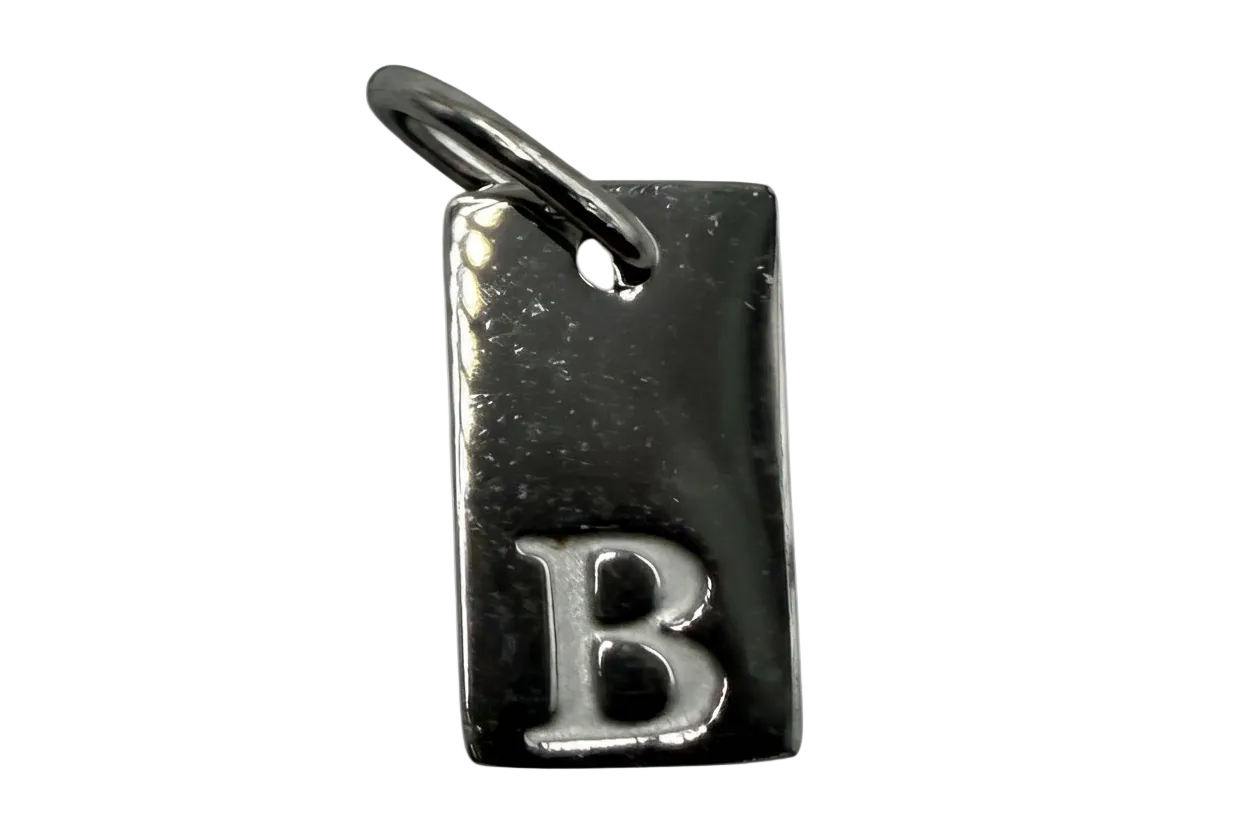 Polished silver rectangular tag with raised letter B