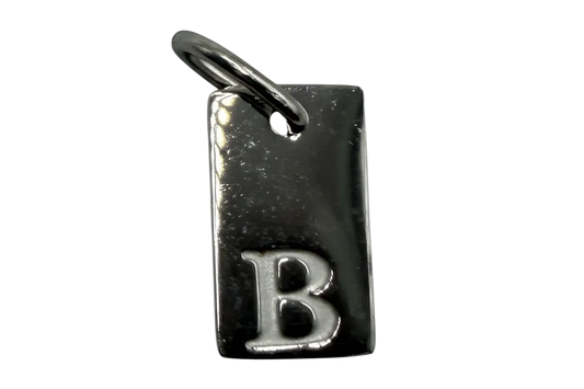 Polished silver rectangular tag with raised letter B