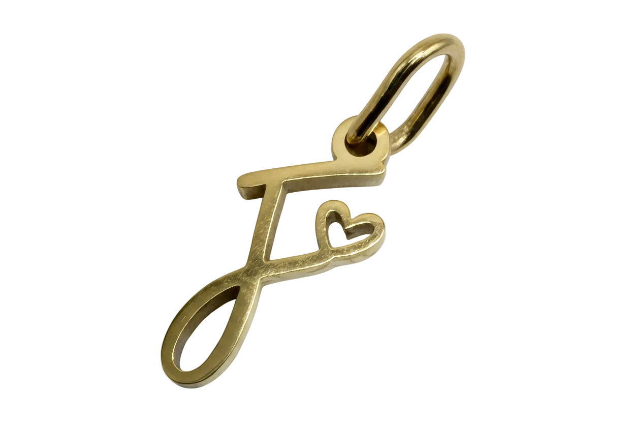 Gold script letter J initial with a small heart accent, polished finish