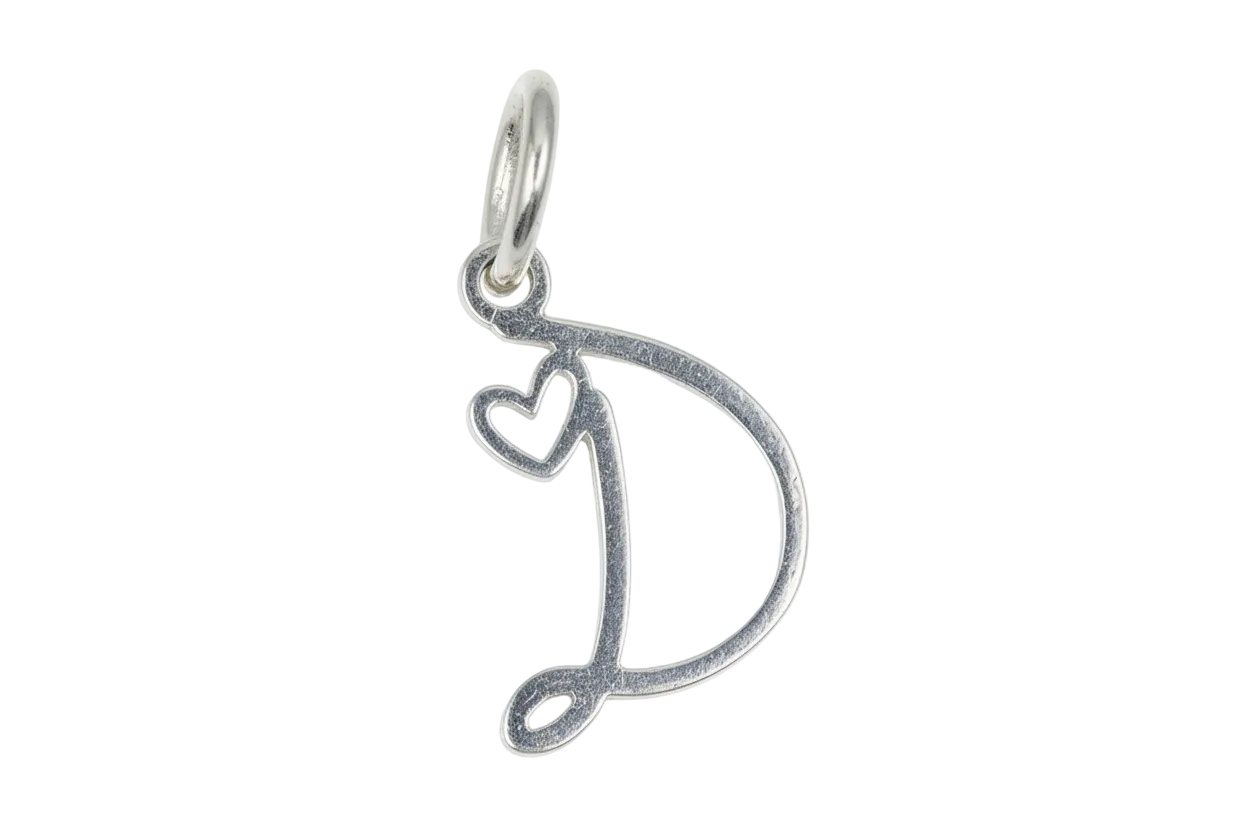 Silver heart-accent music note charm with antiqued finish on black background