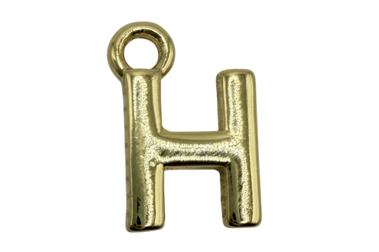 Polished gold letter H initial charm with rounded block silhouette