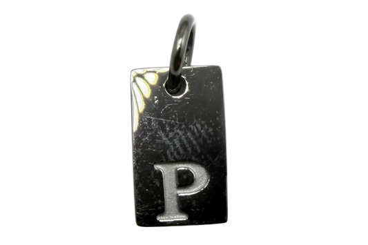 Glossy dark rectangular tag with raised silver letter P