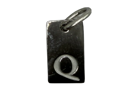 Glossy black rectangular initial Q tag with raised silver letter and polished finish