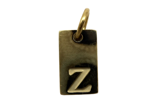 Antiqued gold rectangular tag with raised silver-tone letter Z