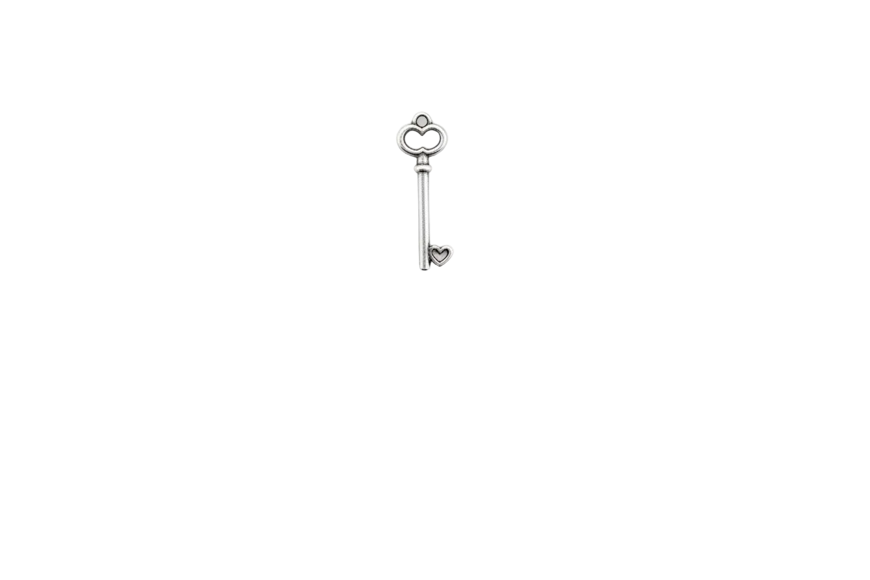 Silver key with heart detail