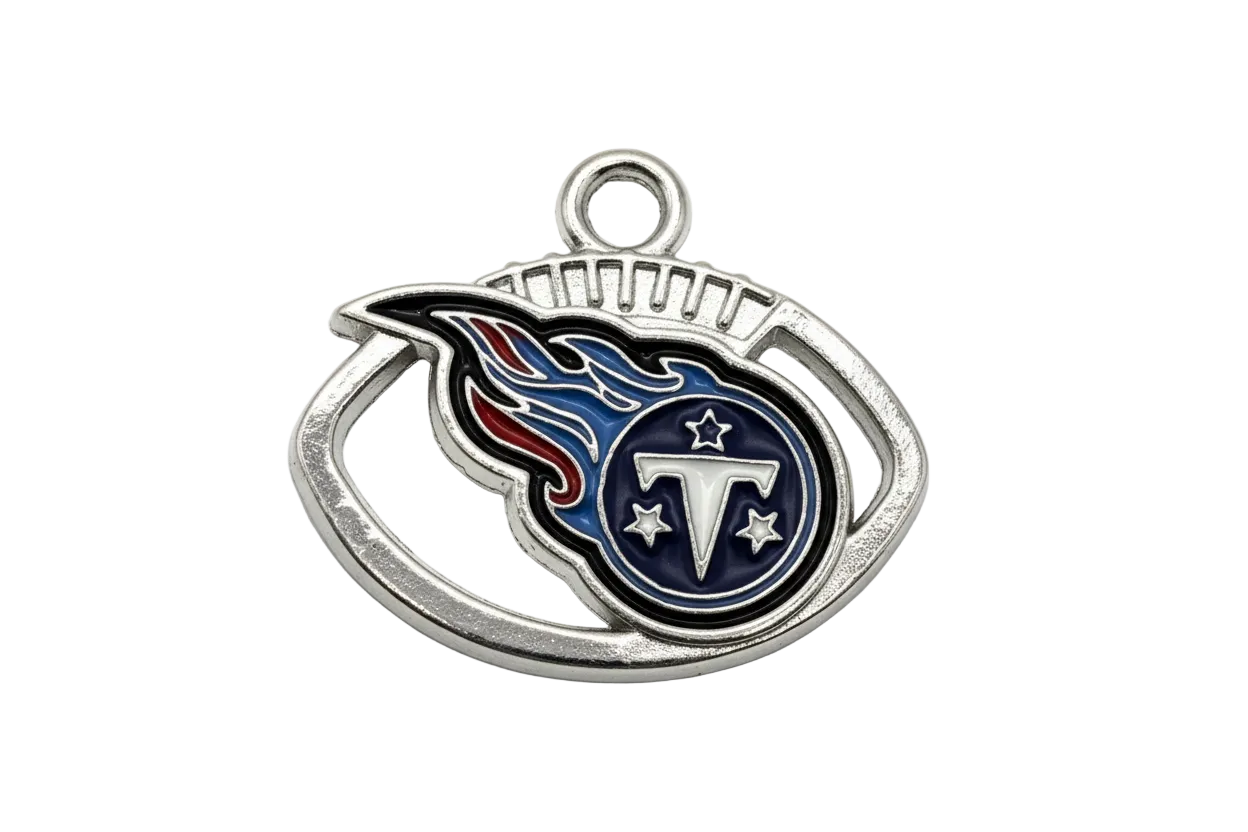 Silver oval helmet emblem with navy enamel flames, red accent, and a letter centerpiece with stars