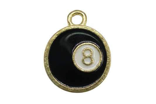 Glossy black eight ball disc with white center and gold number 8, framed in gold