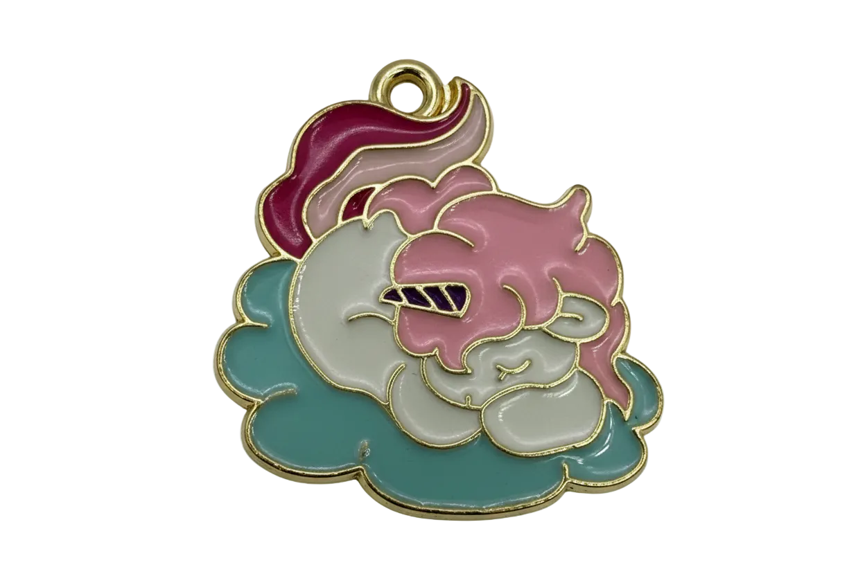 Pastel enamel unicorn head with rainbow mane and cloud accents, outlined in gold