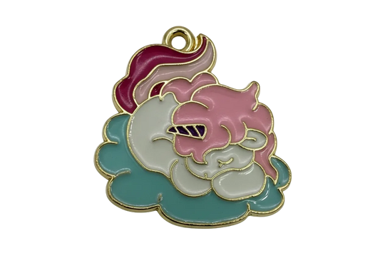 Pastel enamel unicorn head with rainbow mane and cloud accents, outlined in gold