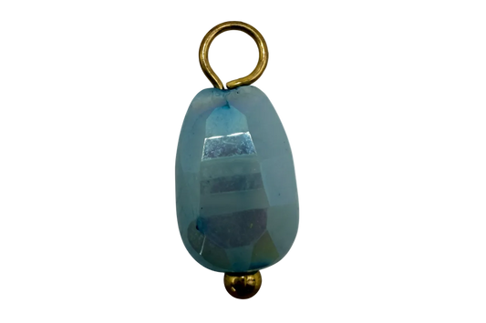 Translucent aqua faceted oval gem with iridescent sheen and gold accents