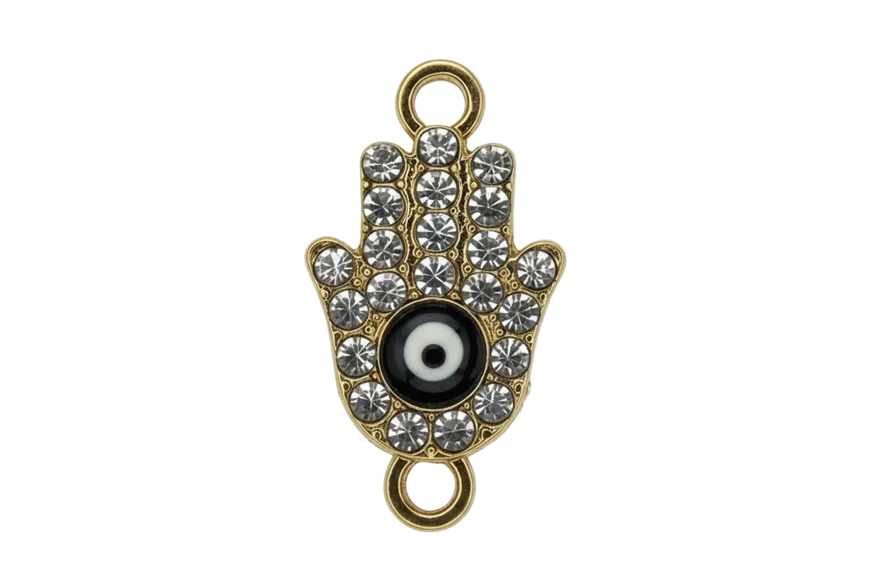 Gold hamsa hand with clear crystals and black-and-white evil eye center