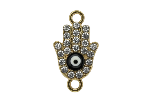 Gold hamsa hand with clear crystals and black-and-white evil eye center