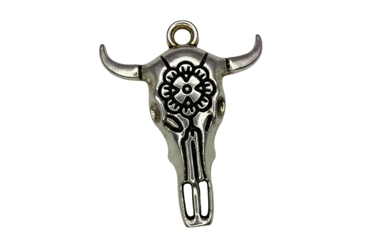Antiqued silver bull skull charm with engraved flower motif and blackened detailing