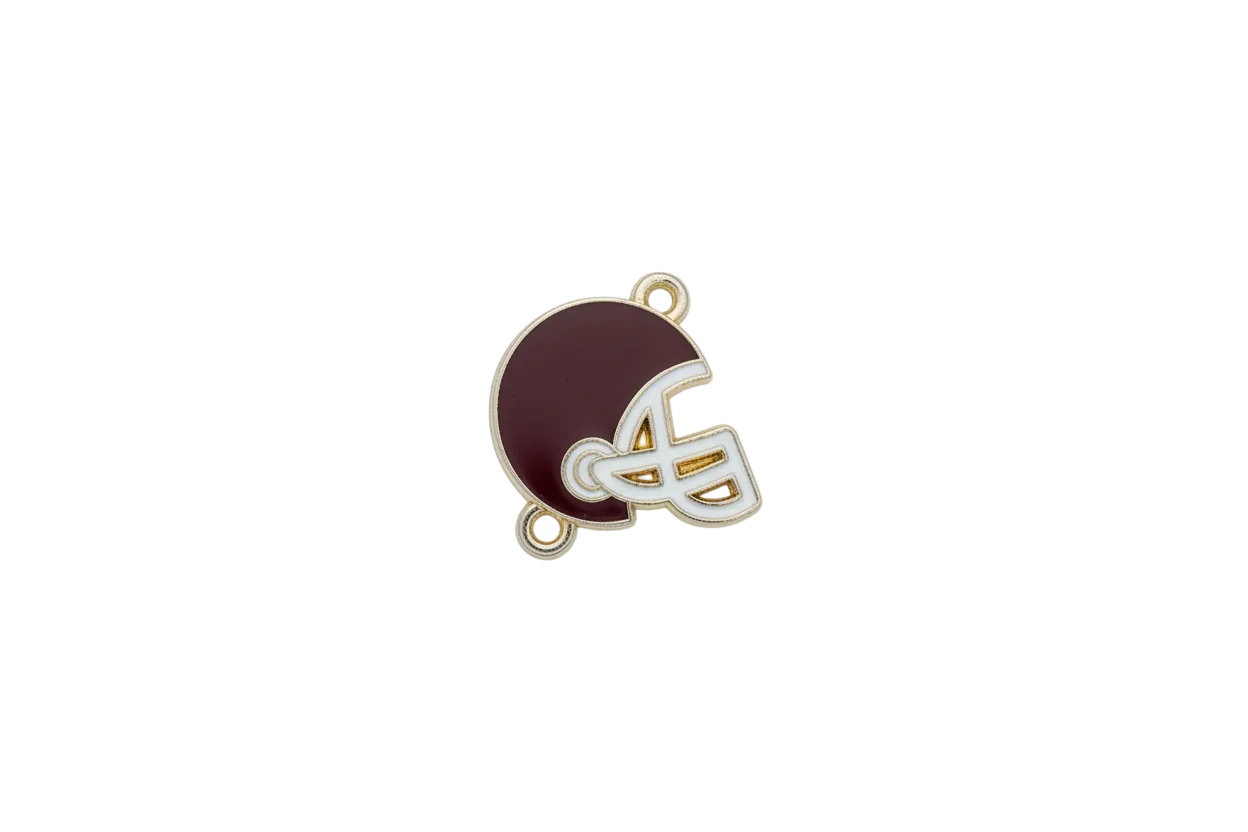 Maroon football helmet charm with white guard and gold outline