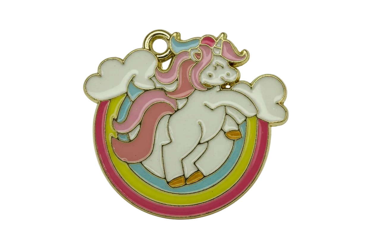 Gold-outlined pastel enamel unicorn over rainbow with clouds on a black background