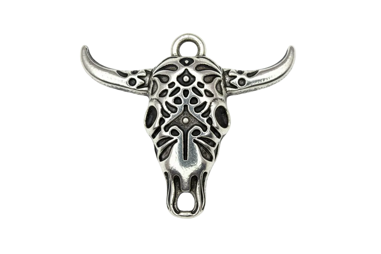 Oxidized silver longhorn skull with ornate cutout details and wide horns