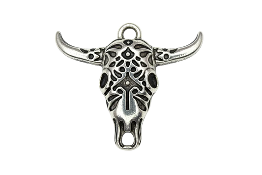 Oxidized silver longhorn skull with ornate cutout details and wide horns