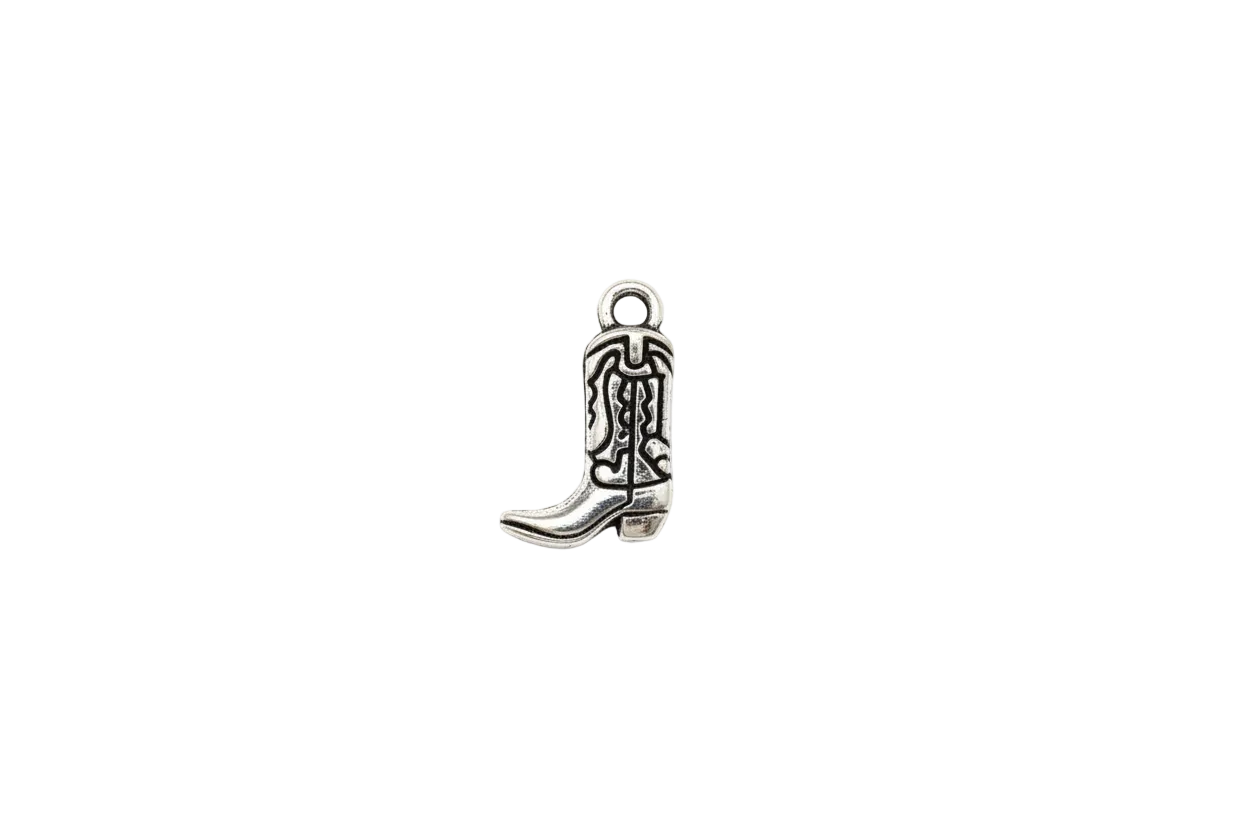 Silver cowboy boot with engraved western details