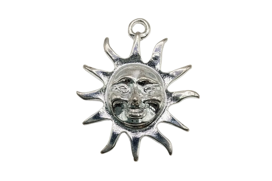 Polished silver sunburst medallion with sculpted smiling face
