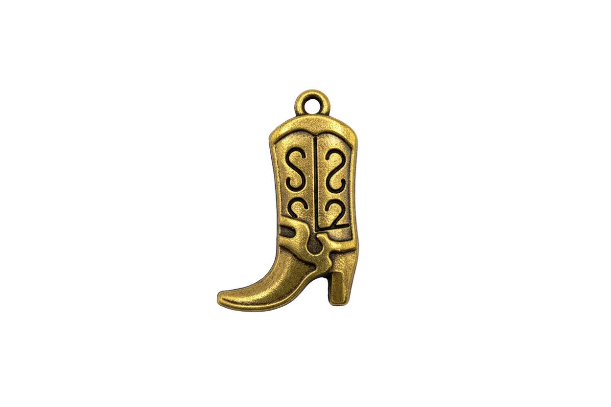 Gold cowboy boot with engraved scrollwork