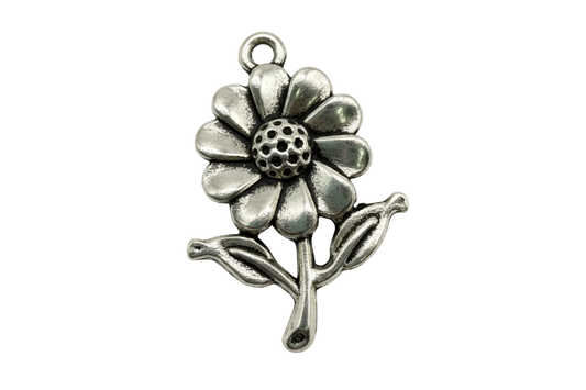 Antique silver daisy flower charm with dotted center and curved leaves