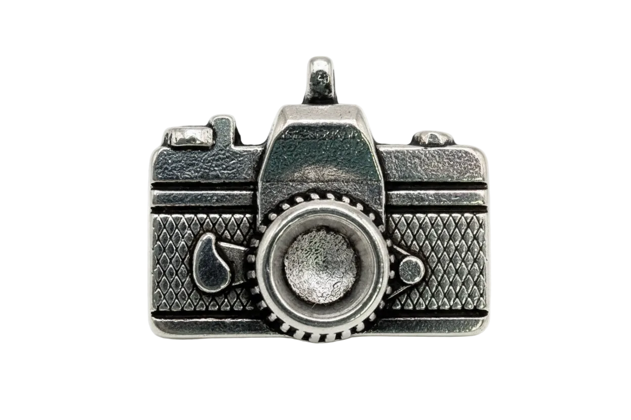 Silver vintage camera charm with textured body and raised lens detail