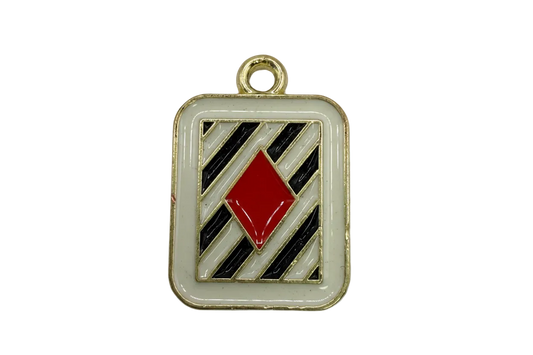 Gold-framed square with black and white diagonal stripes and a red diamond center