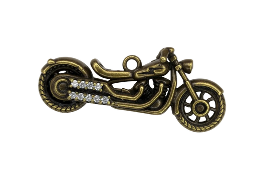 Antiqued gold motorcycle charm with clear crystal accents and darkened detail lines