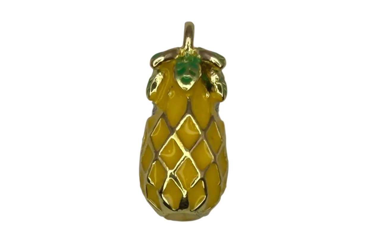 Glossy yellow pineapple charm with green leaves and gold detailing