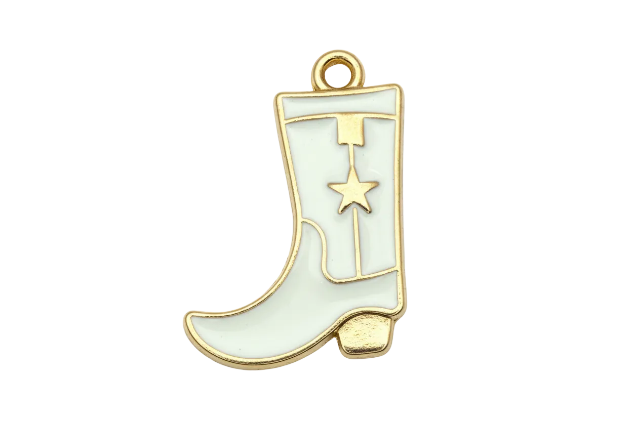 White enamel western boot with gold outline and star detail