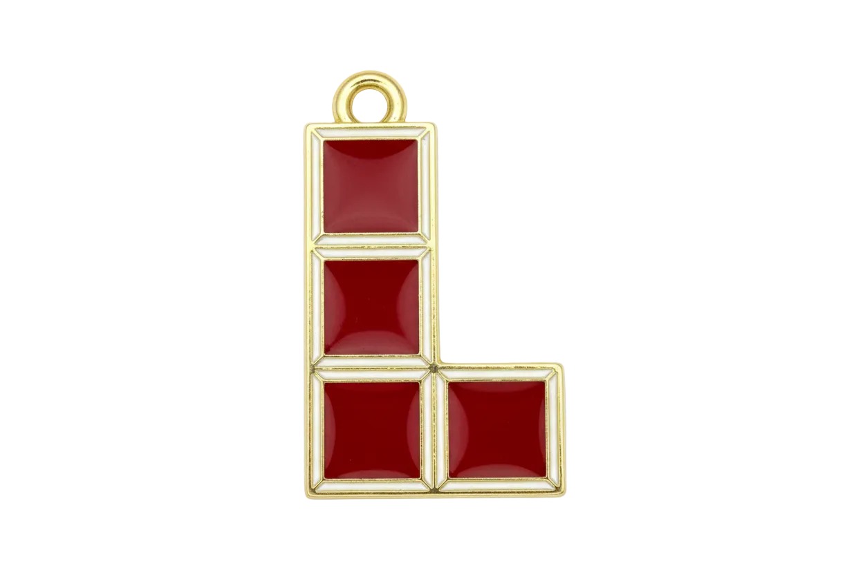 Glossy red enamel block puzzle piece in an L-shape with gold outline
