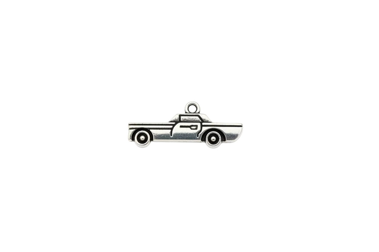 Silver-tone pickup truck silhouette with engraved details