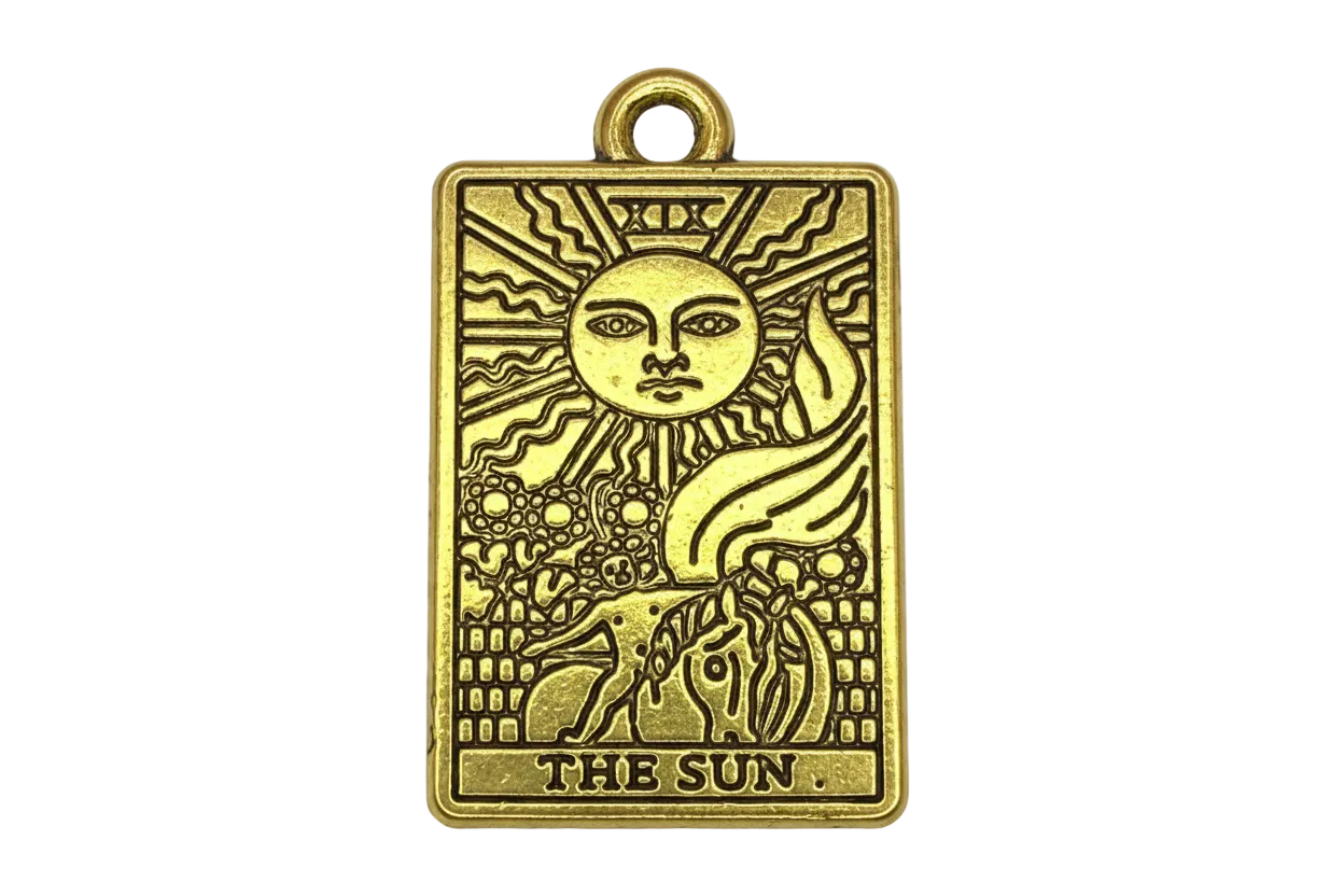 Antiqued gold rectangular sun tarot card with engraved face, rays, horse, and “THE SUN” text