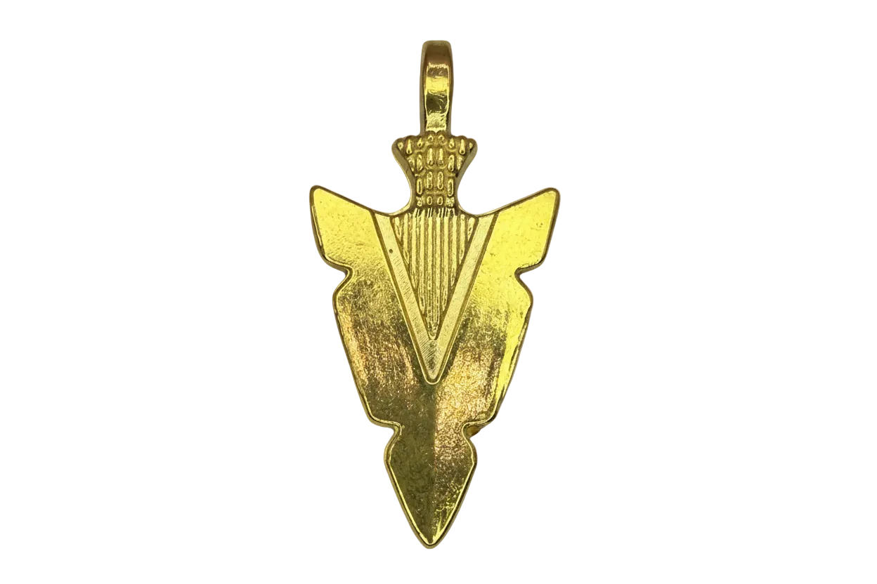 Gold arrowhead pendant with engraved detailing and pointed silhouette