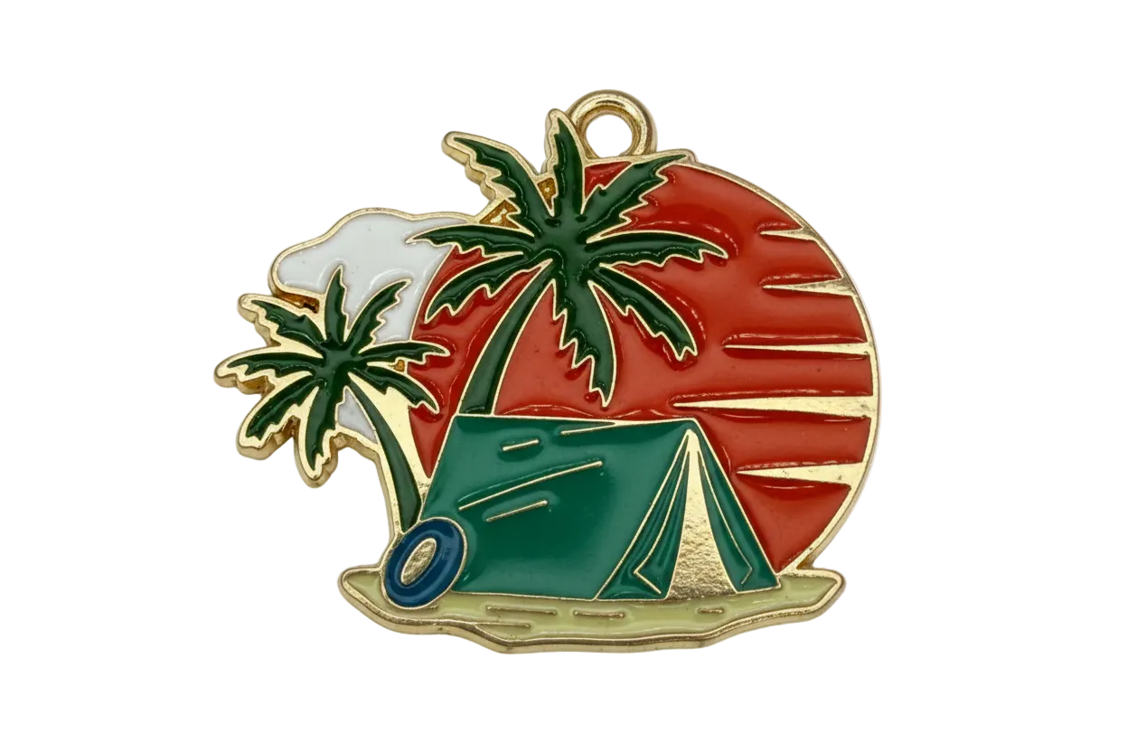 Gold-outlined enamel camping scene with green tent and palm trees on a red sunset backdrop