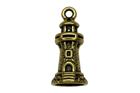Antique gold lighthouse tower charm with blackened detailing