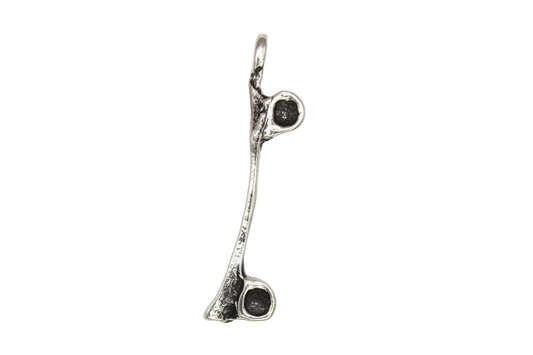 Antiqued silver lowercase i letter charm with oxidized details on black background