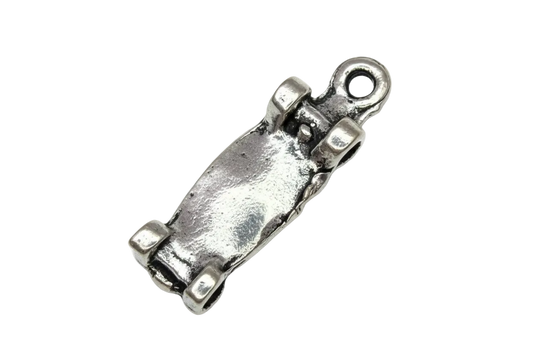 Antiqued silver skateboard pendant with raised wheel details