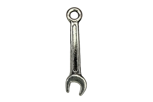 Polished silver mini open-end wrench motif with recessed detailing on black background