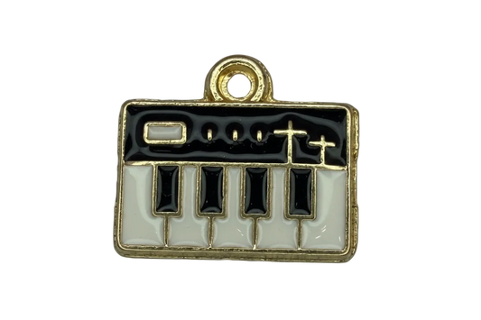 Gold-trim piano keyboard charm with glossy black and white enamel keys